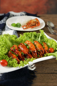 Close-up of salad served in plate on table