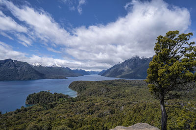 Scenic view of landscape and mountains against sky