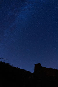 Low angle view of stars against sky at night