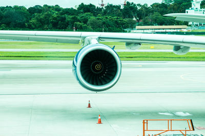 View of airplane in airport runway