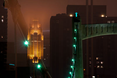 Low angle view of illuminated building at night