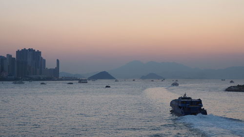 Scenic view of sea against clear sky during sunset