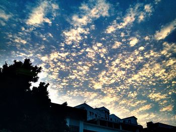 High section of building against cloudy sky