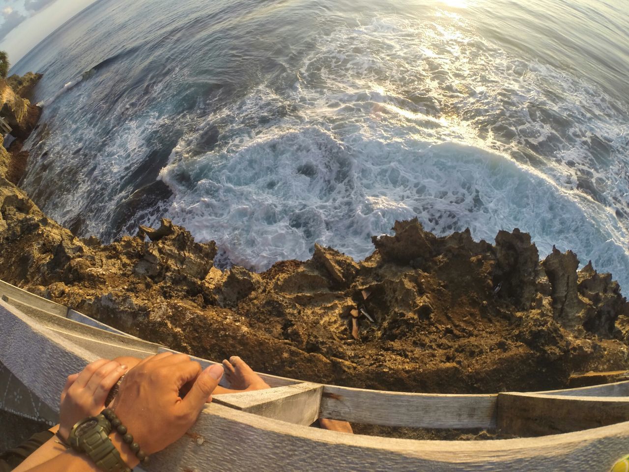 water, high angle view, nature, sea, relaxation, mountain, scenics, part of, day, vacations, beauty in nature, surf, mammal, sunlight, dog, personal perspective, beach, tranquility