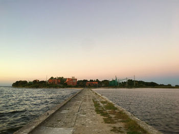 Scenic view of beach against clear sky