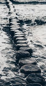High angle view of water flowing in river