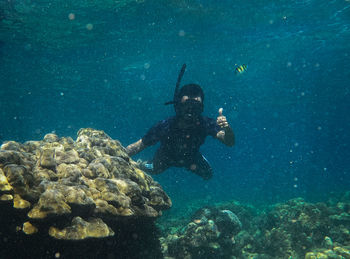 Man swimming in sea