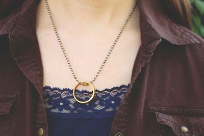 Midsection of woman wearing mask