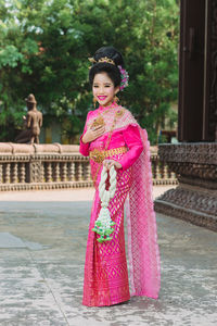 Portrait of smiling girl in traditional clothing