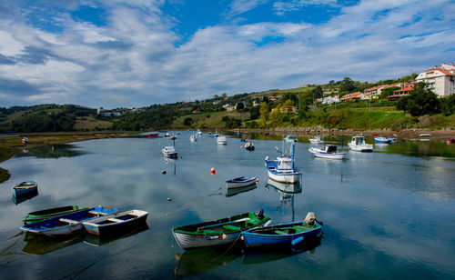 Boats moored at lake