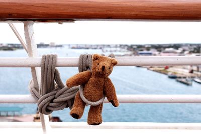 Close-up of railing against sea