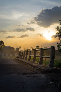 Scenic view of field against sky during sunset