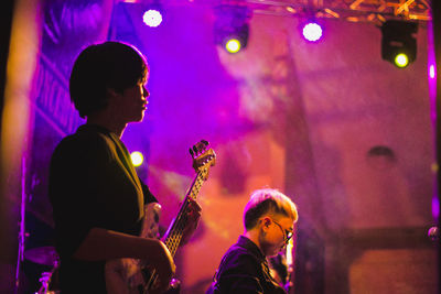 Man playing in music concert