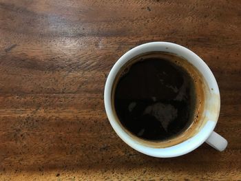 High angle view of coffee cup on table