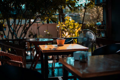 Empty chairs and tables in cafe