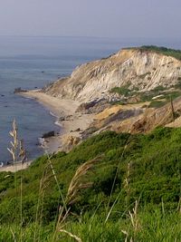 Scenic view of rock formations on hill