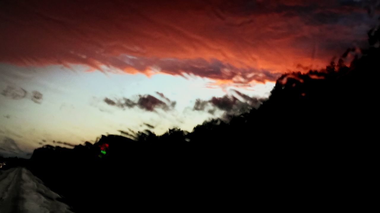 sky, silhouette, sunset, scenics, tranquil scene, beauty in nature, tranquility, cloud - sky, nature, weather, dusk, landscape, mountain, cloudy, idyllic, dark, dramatic sky, cloud, overcast, outdoors