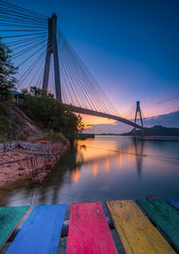 Suspension bridge over river