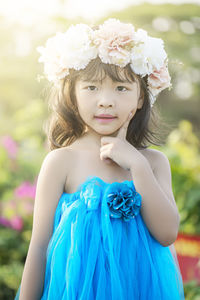 Portrait of a beautiful woman with flower head