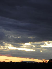 Scenic view of dramatic sky during sunset