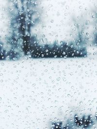 Close-up of water drops on glass