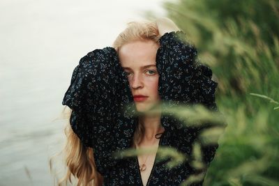 Portrait of young woman looking away