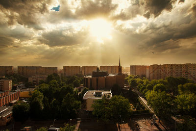 High angle view of buildings against sky at sunset