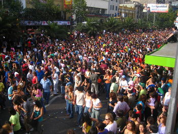 High angle view of people standing on street