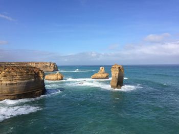 Scenic view of sea against blue sky