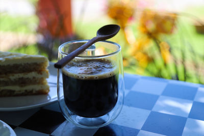 Close-up of coffee served on table