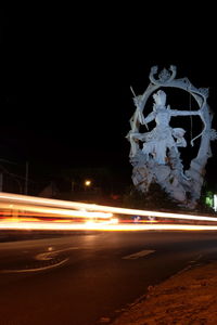 Light trails on road at night