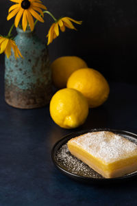 Close-up of fruits in plate on table