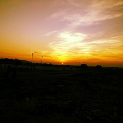 Scenic view of silhouette landscape at sunset