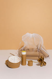 High angle view of beauty products against pink background