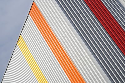 Low angle view of multi colored metallic wall