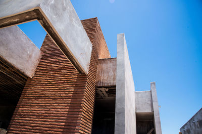 Low angle view of old building against sky