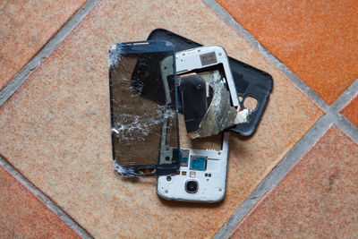 High angle view of damaged car on floor