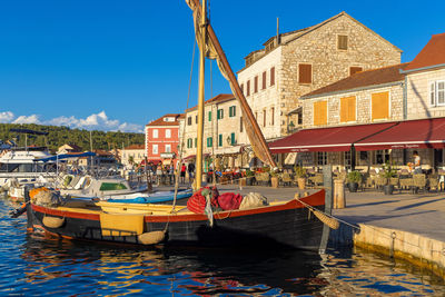 The traditional wooden sailing boat in the port of stari grad town on hvar island, croatia