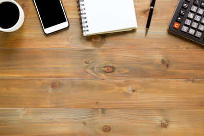 High angle view of mobile phone on table