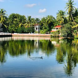 Scenic view of lake and building