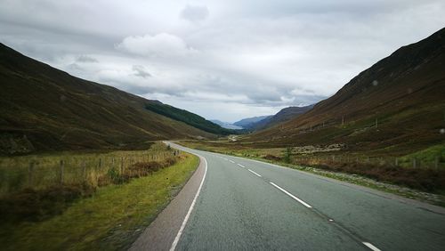 Road on mountain against sky