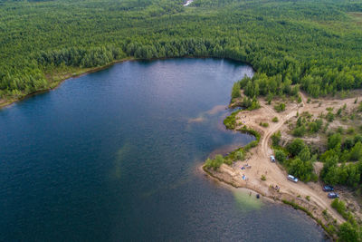 High angle view of lake amidst trees in forest