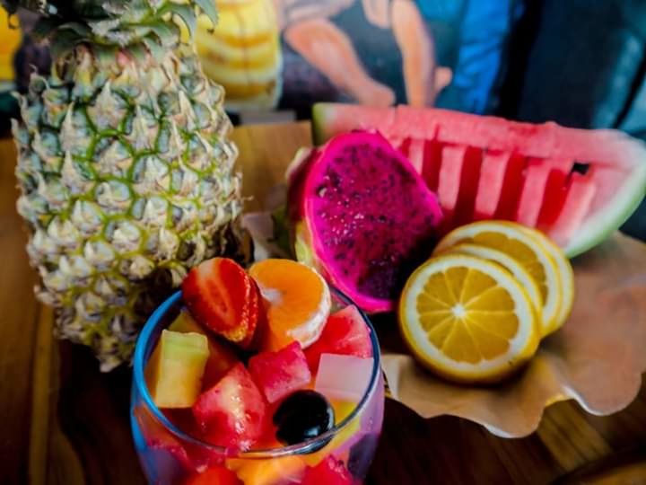 fruit, food and drink, food, healthy eating, freshness, pineapple, wellbeing, tropical fruit, refreshment, citrus fruit, close-up, slice, indoors, glass, berry fruit, drink, focus on foreground, drinking glass, household equipment, cross section, no people, orange