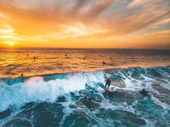 Scenic view of sea against sky during sunset