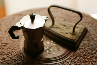 Close-up of coffee cup on table