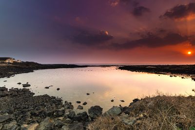 Scenic view of sea against sky during sunset