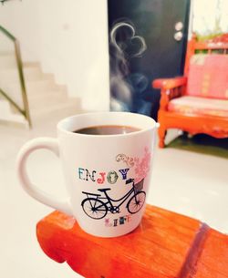 Close-up of coffee cup on table