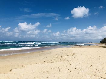Scenic view of beach against sky