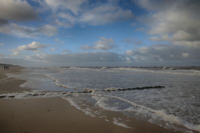 Scenic view of beach against sky