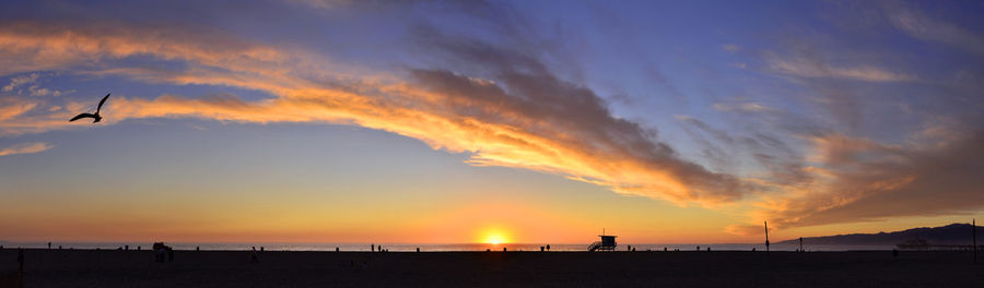 Scenic view of sea at sunset